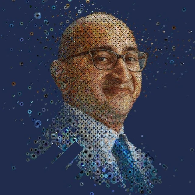 Digitally enhanced portrait of a man with glasses and a tie, made from many small circles on a dark blue background.
